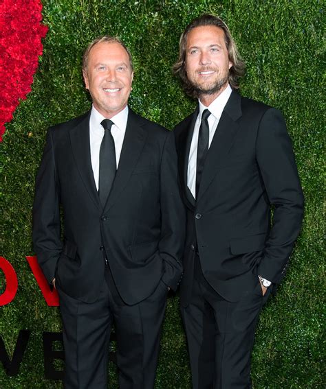 michael kors husband pictures.